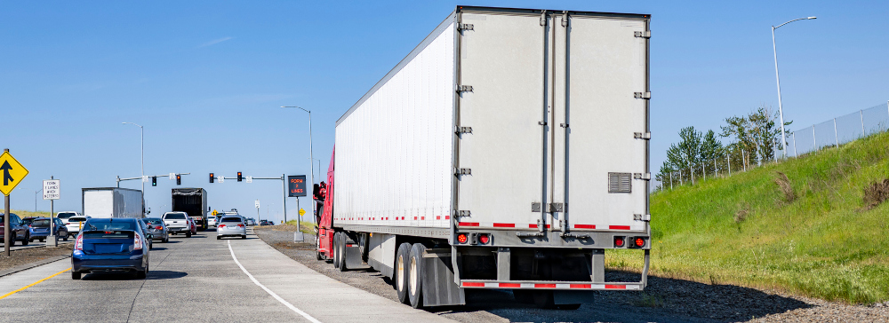 An 18 wheeler pulled over on the side of the highway after a truck accident in Texas