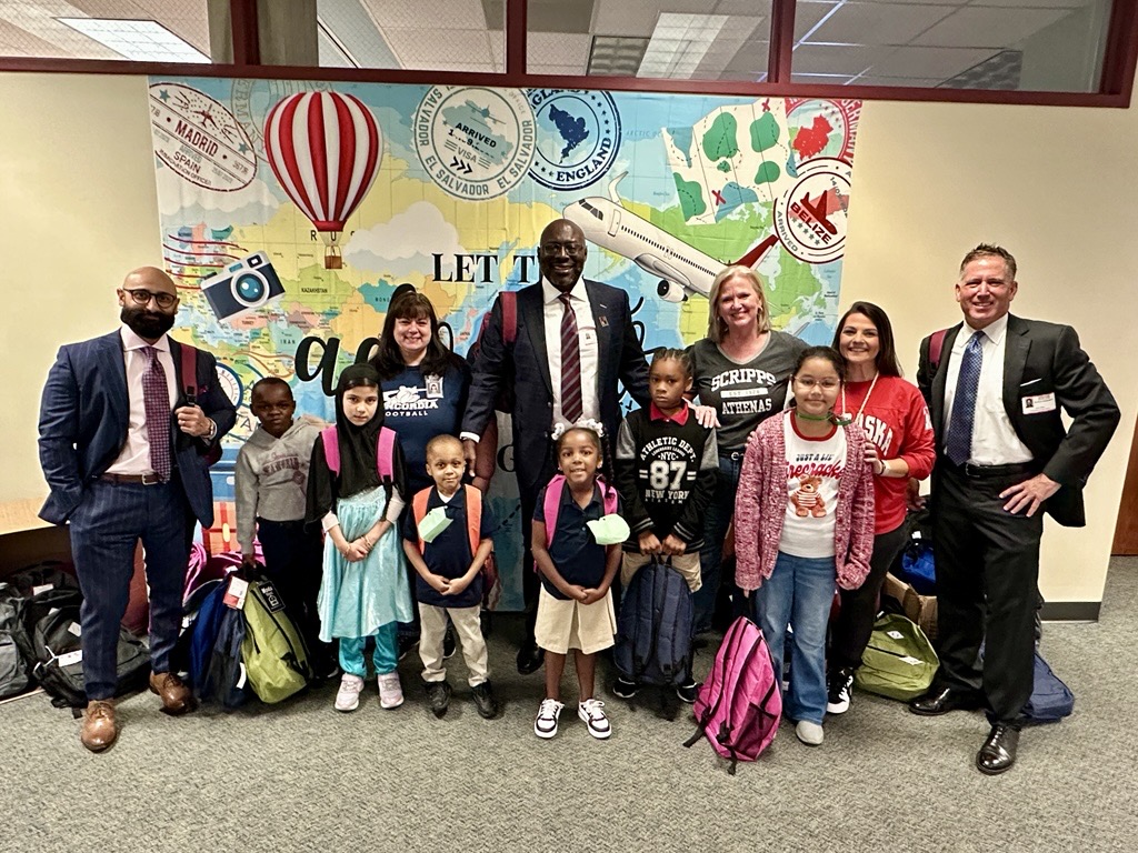 Houston personal injury lawyers D. Miller & Associates donating school supplies to Sneed Elementary School