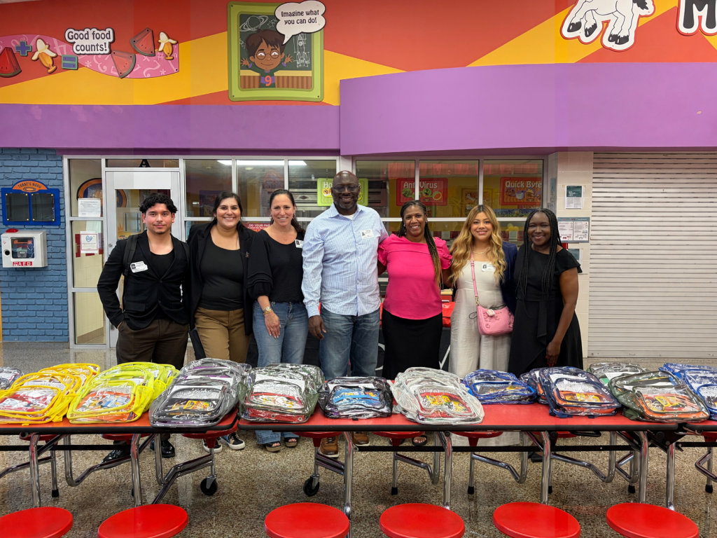 D. Miller & Associates team during the 2026 backpack donation drive